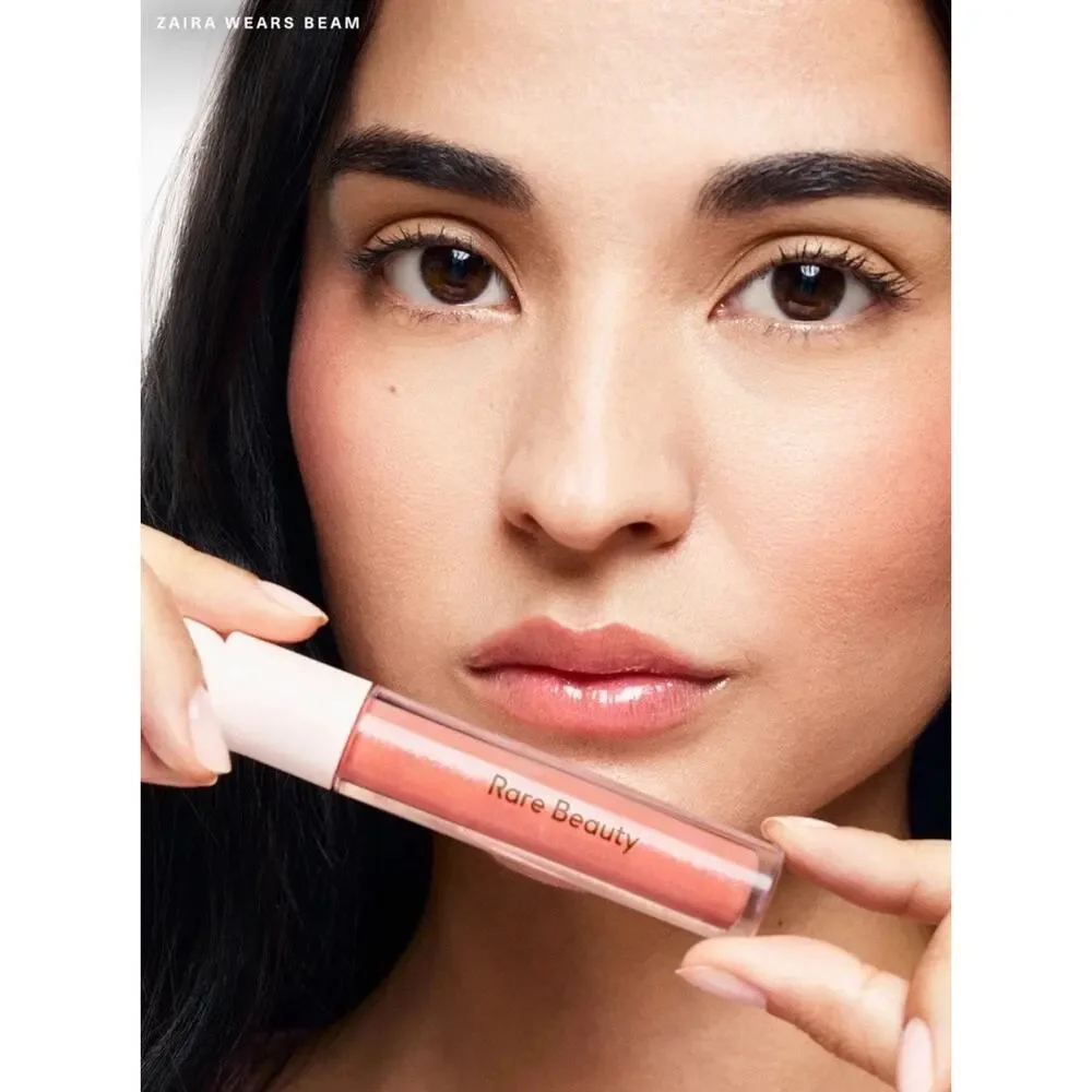 Rare Beauty Positive Light Luminizing Lip Gloss Beam Peachy Coral Shimmer